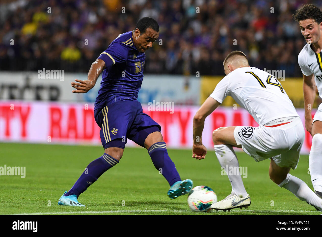 Maribor, Slovenia. 24th July, 2019. Marcos Tavares of Maribor and Karol  Mets of AIK in action during the Second qualifying round of the UEFA Champions  League between NK Maribor and AIK Football
