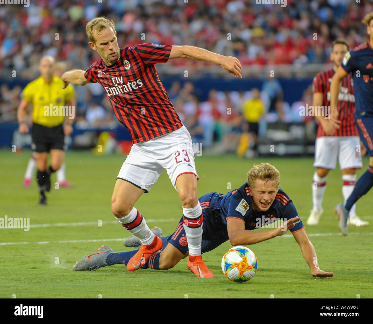 Kansas City, KS, USA. 23rd July, 2019. AC Milan defender, Ivan Strinic (23), and Bayern forward, Fiete Arp (15), clash while working for ball control during the 2019 International Champions Cup match between AC Milan and FC Bayern, at Children's Mercy Park in Kansas City, KS. Bayern defeated AC Milan, 1-0. Kevin Langley/Sports South Media/CSM/Alamy Live News Stock Photo