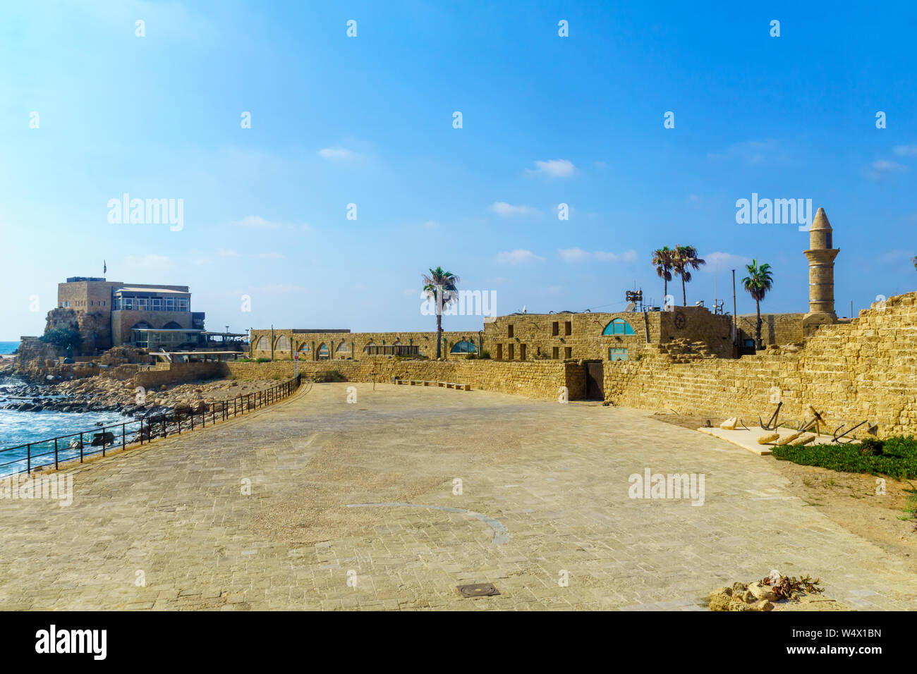View of the beach promenade and the old port in Caesarea National Park, Northern Israel Stock Photo