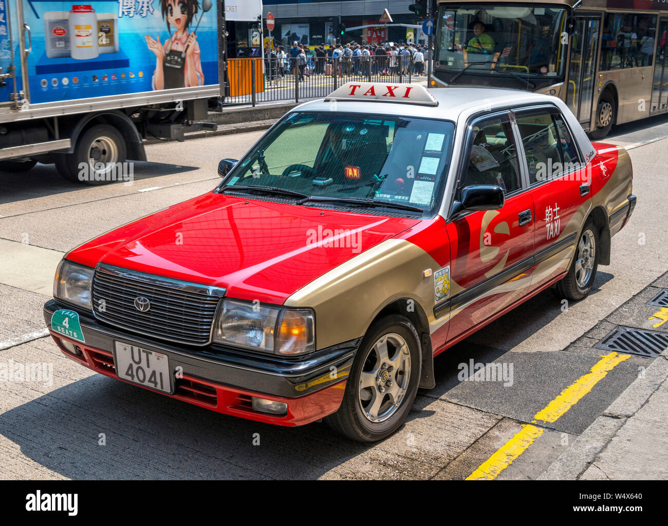 Typical Hong Kong taxi on Nathan Road in Mong Kok, Kowloon, Hong Kong, China  Stock Photo - Alamy