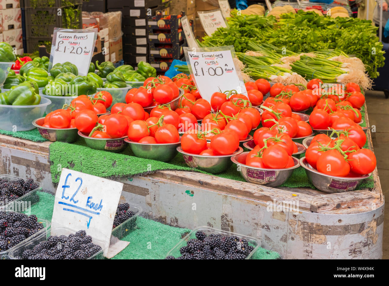 Fruit and vegetables for sale on market stall, UK Stock Photo