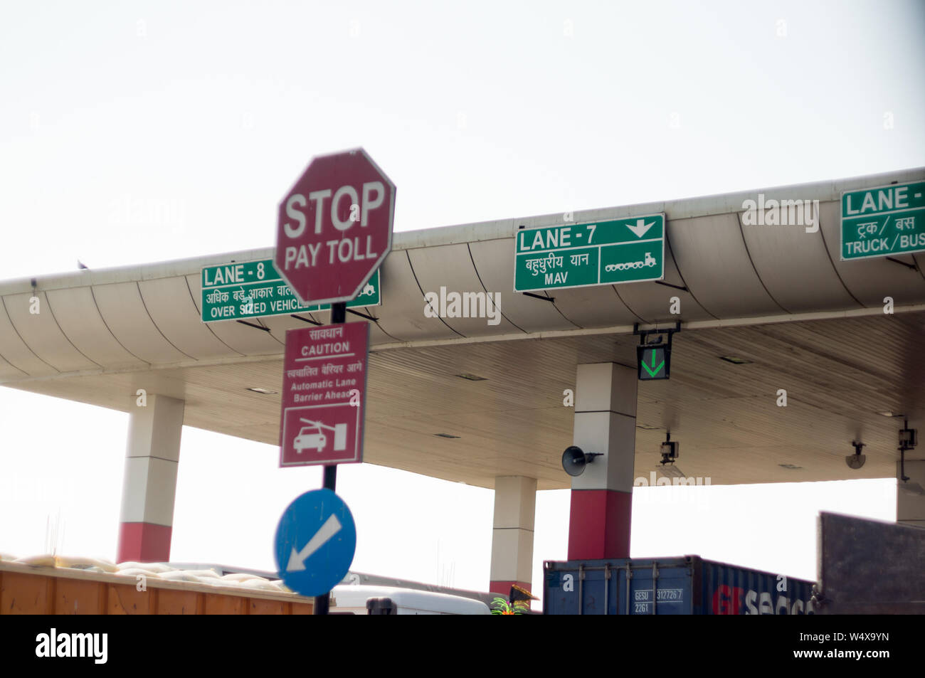 Shot of a toll booth showing the lanes, signs and lights Stock Photo - Alamy