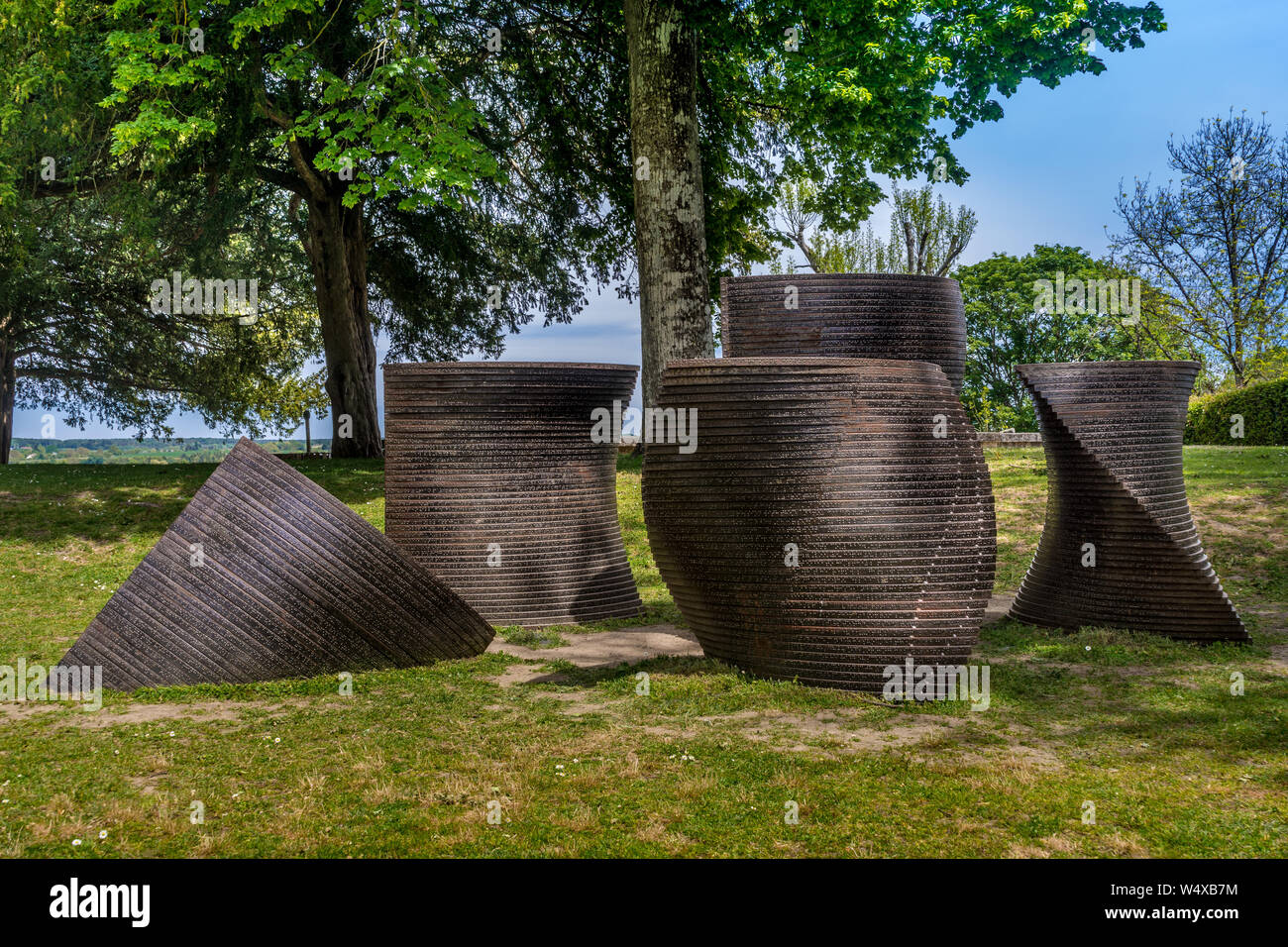 "And the night came" abstract geometric bronze sculpture by Laurent Verrier, 2018, in the chateau public gardens, Loches, Indre-et-Loire, France. Stock Photo