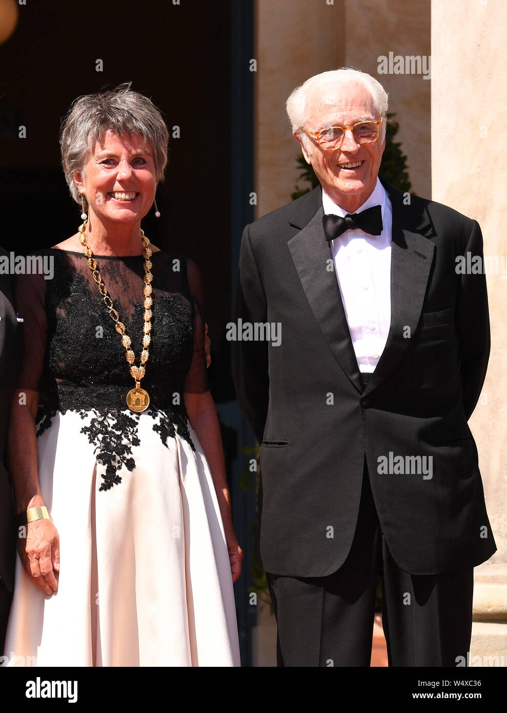 Bayreuth, Germany. 25th July, 2019. Franz Herzog von Bayern stands next to the Lord Mayor of Bayreuth Brigitte Merk-Erbe at the Bayreuth Festival 2019. The Richard Wagner Festival began in Bayreuth on Thursday. Credit: Tobias Hase/dpa/Alamy Live News Stock Photo