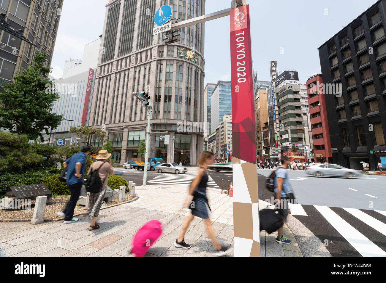 Tokyo Japan 25th July 2019 Pedestrians Walk Past An Olympic