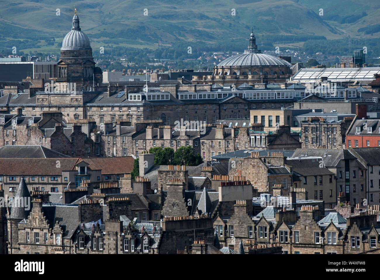 The view from Calton Hill looking South towards the dome of Edinburgh University's Old College and in the distance the Pentland Hills. Stock Photo