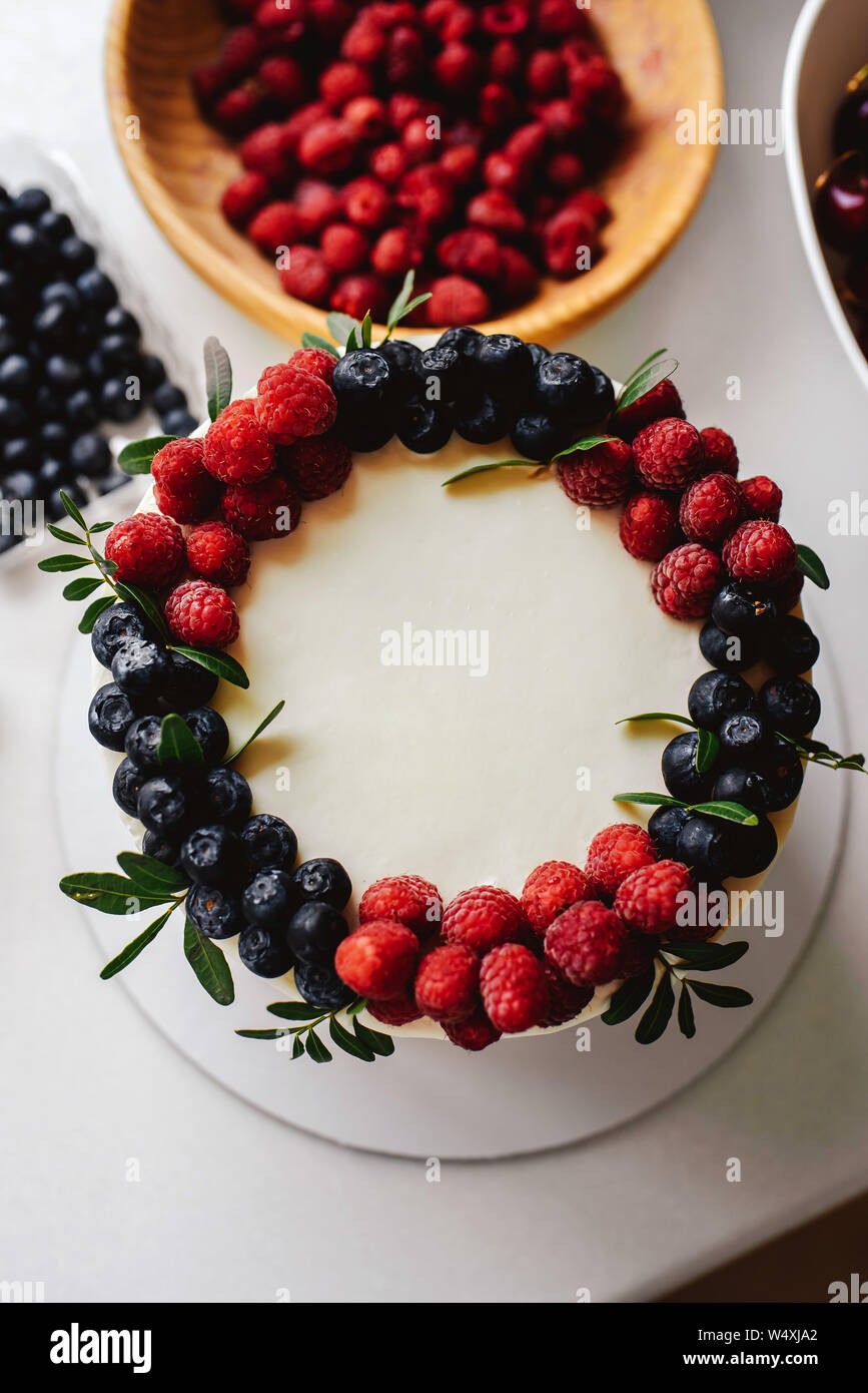 Delicious berry Cake with Fresh Raspberry and Blueberry Stock Photo Alamy