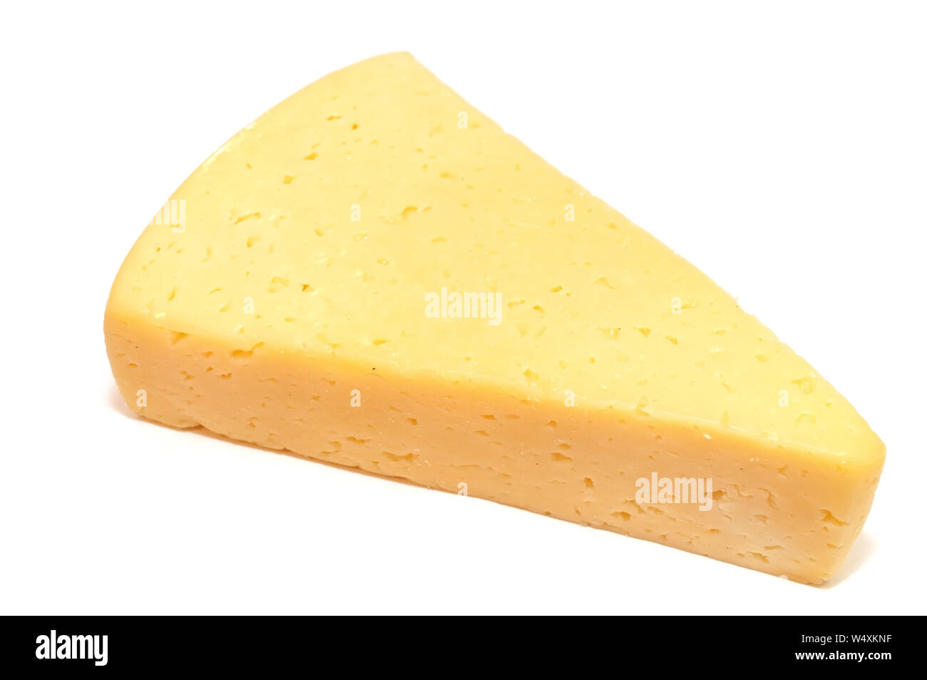 Hard cheese isolated on white Stock Photo