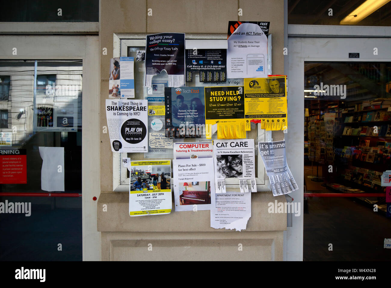 A community bulletin board at a college bookstore filled with junk