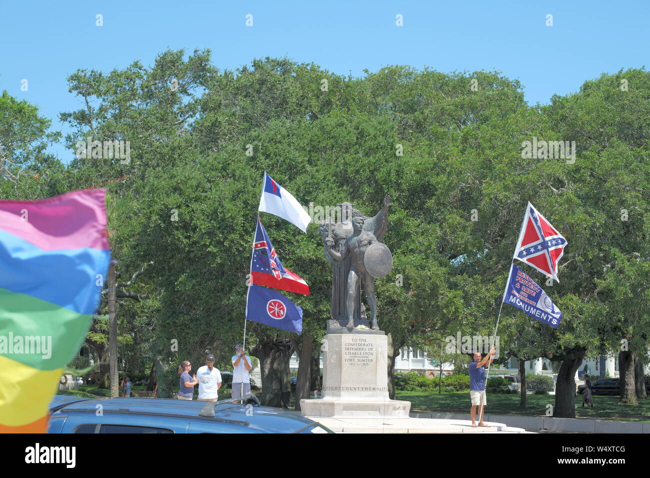 Public Protesters on a Sunday Morning Supporting  the Flying of Confederate Flags, But Opposed by LBGT Supporters and Anti Confederate Flag Protestors Stock Photo