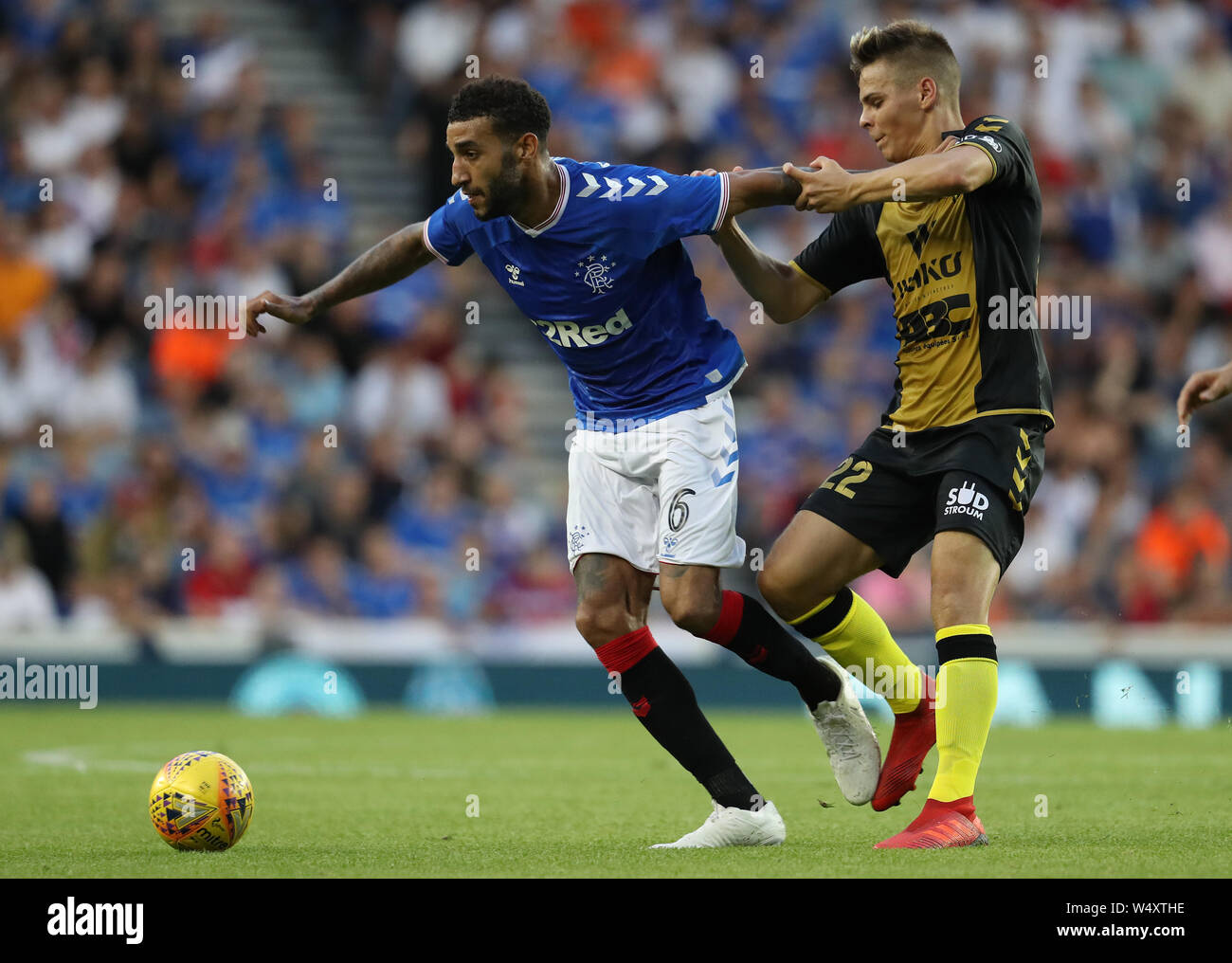 Rangers Connor Goldson Challenges Progres Niederkorn S Kempes Waldemar Tekiela During The Europa League Qualifying Match At Ibrox Stadium Glasgow Stock Photo Alamy