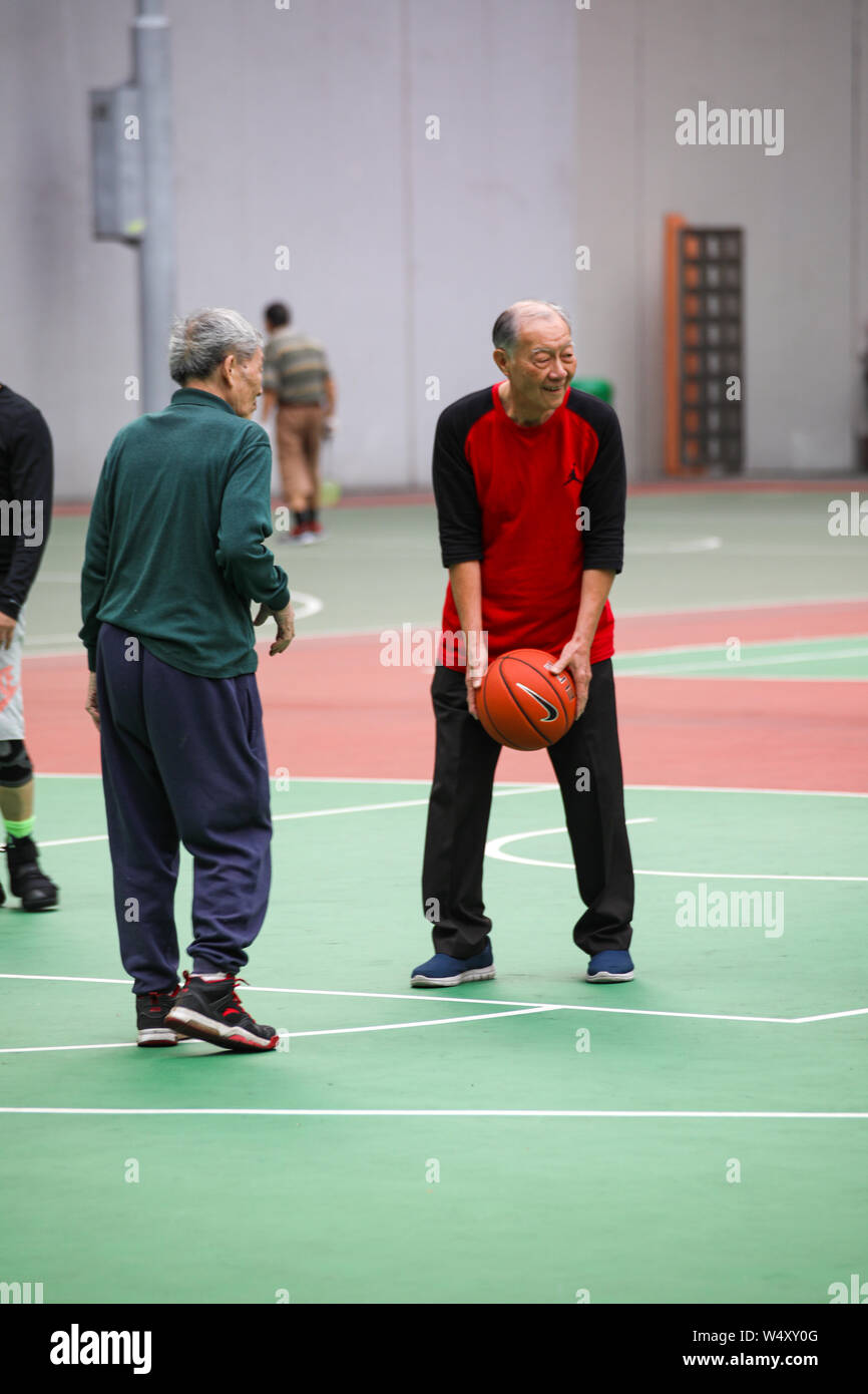 Senior citizens playing basketball in Southorn Playground in Wan Chai