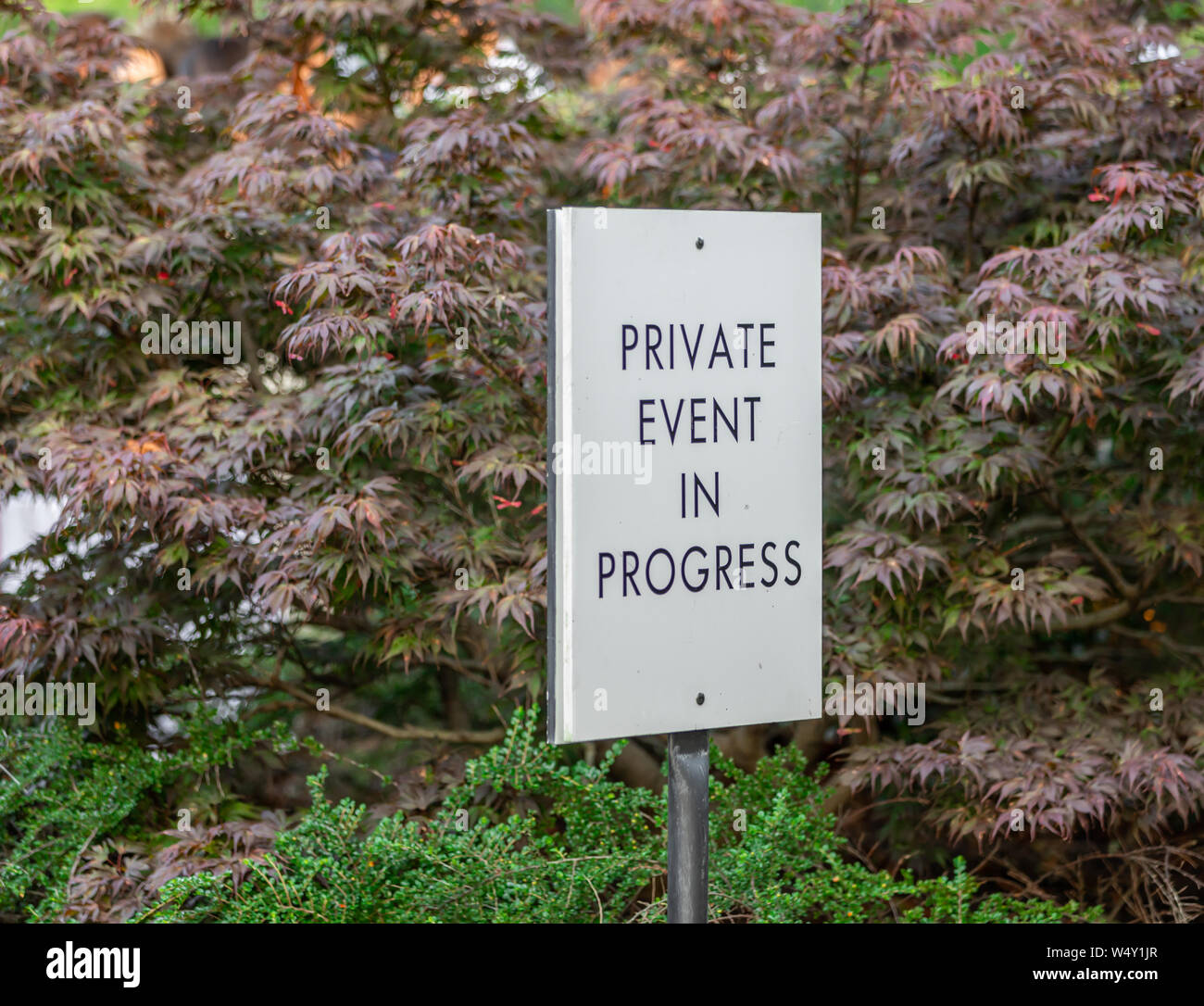 sign stating a private event in progress at Topping Rose in Bridgehampton, NY Stock Photo