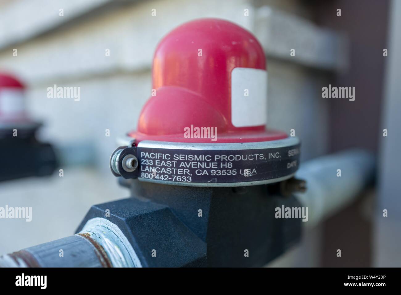 Close-up of automatic seismic natural gas shutoff valve from Pacific Seismic Products, used to automatically cut off the flow of natural gas during an earthquake, installed on a building in the San Francisco Bay Area, Lafayette, California, April 9, 2019. () Stock Photo