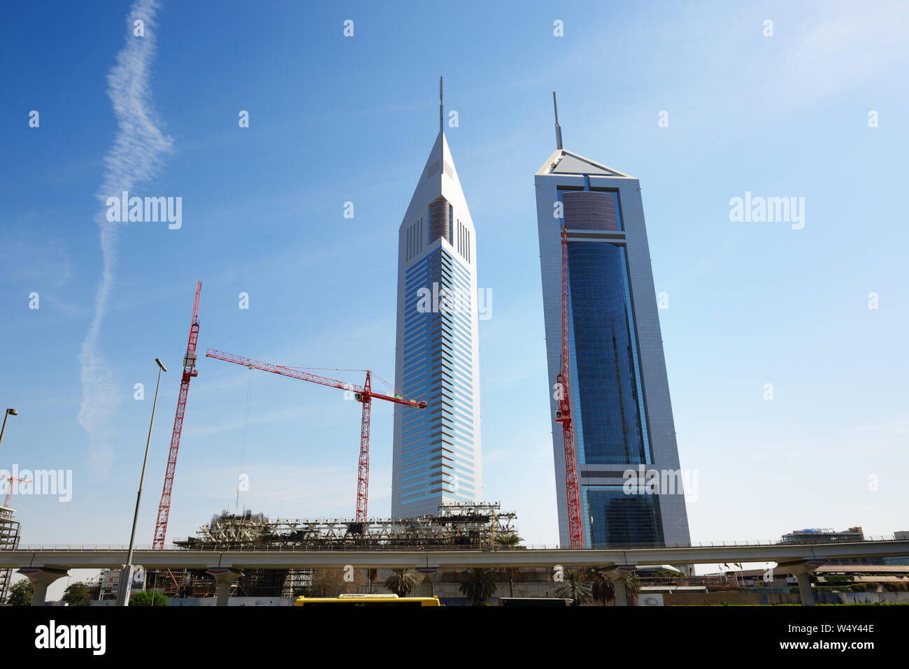 DUBAI, UAE - NOVEMBER 19: The view on Emirates Towers and new costruction on November 19, 2017. The Emirates Towers complex is set in over 570,000 m2 Stock Photo