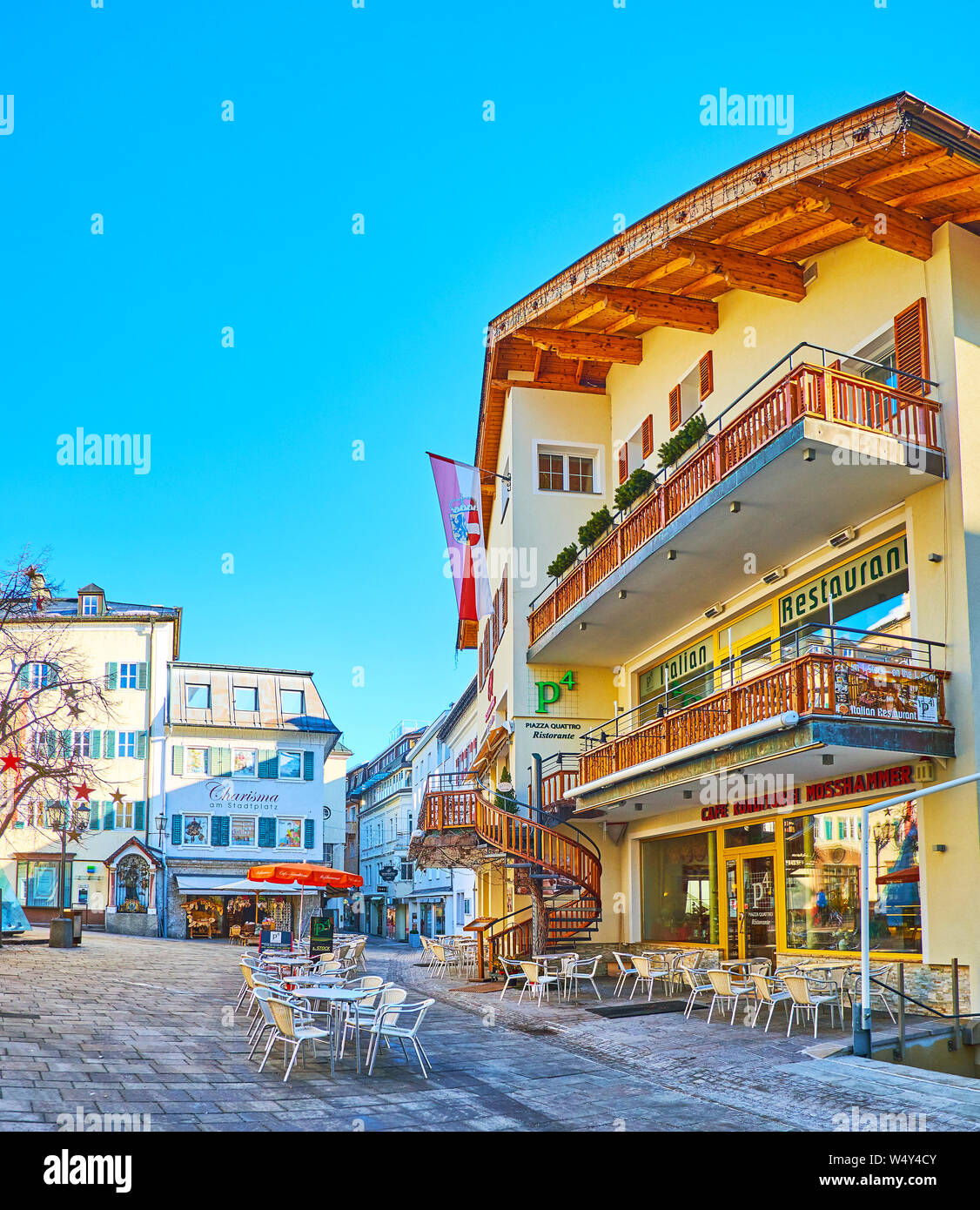 The old edifices, tourist stores and restaurants in Stadtplatz square, Zell am See, Austria Stock Photo