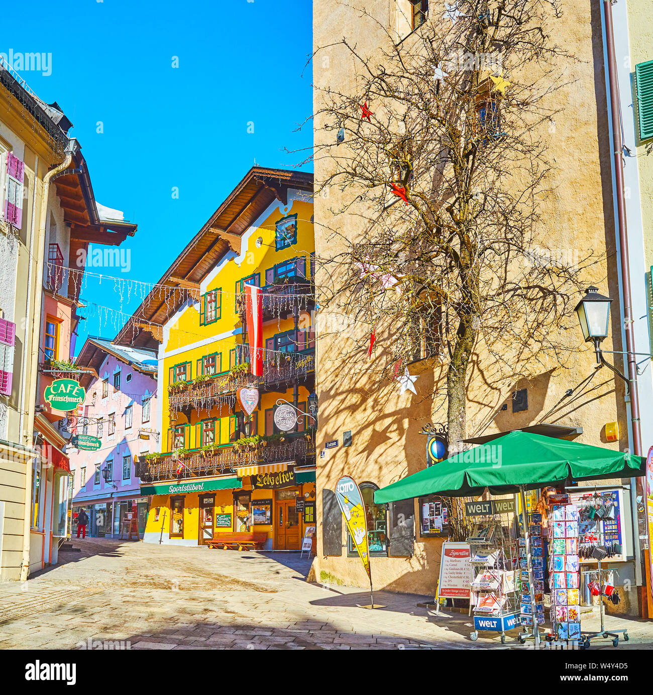 ZELL AM SEE, AUSTRIA - FEBRUARY 28, 2019: The city center boasts scenic townhouses and traditional edifices of popular tourist hotels, old restaurants Stock Photo