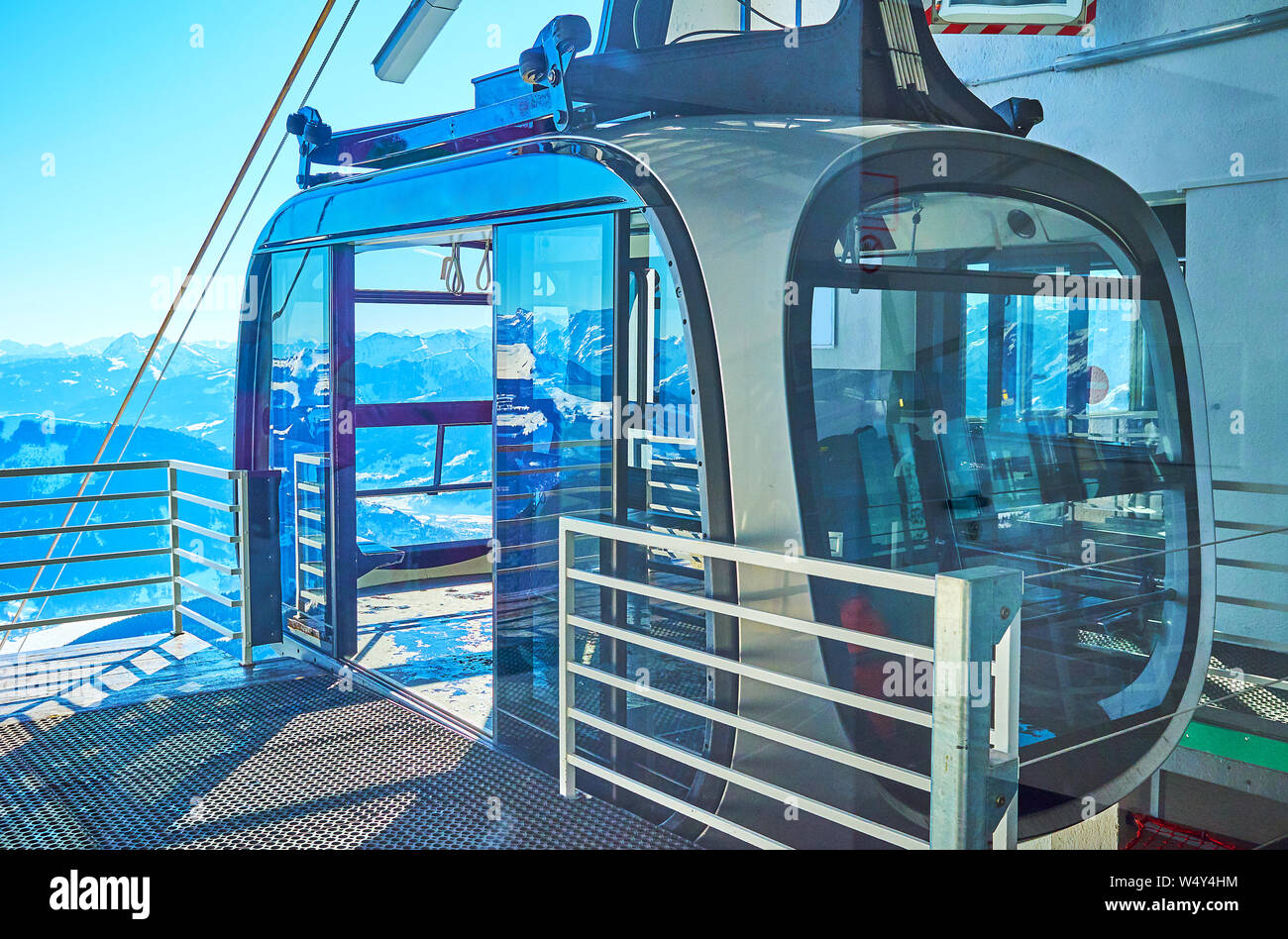 Take a ride on modern tram of cableway, connecting Zell am See with Schmittenhohe mountain peak, Austria Stock Photo