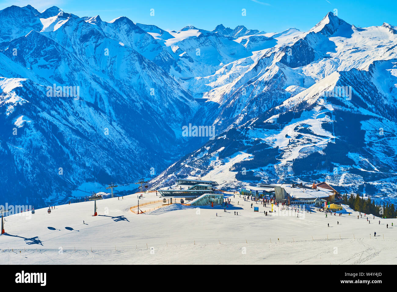 Schmittenhohe mountain top overlooks great Alpine scenery, with recreational base at Areitbahn cable car, Zell am See, Austria Stock Photo