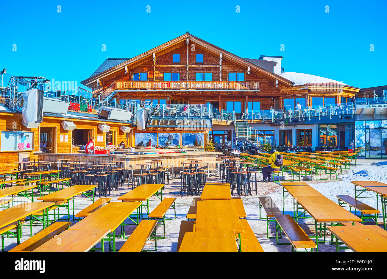 ZELL AM SEE, AUSTRIA - FEBRUARY 28, 2019: Relax in modern lounge bar with large courtyard, located on the top of Schmitten mountain, on February 28 in Stock Photo