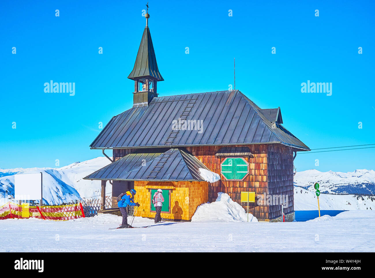 The small wooden Elizabeth chapel is the main architectural landmark, located on the top of Schmittenhohe mountain, becoming popular ski resort in win Stock Photo