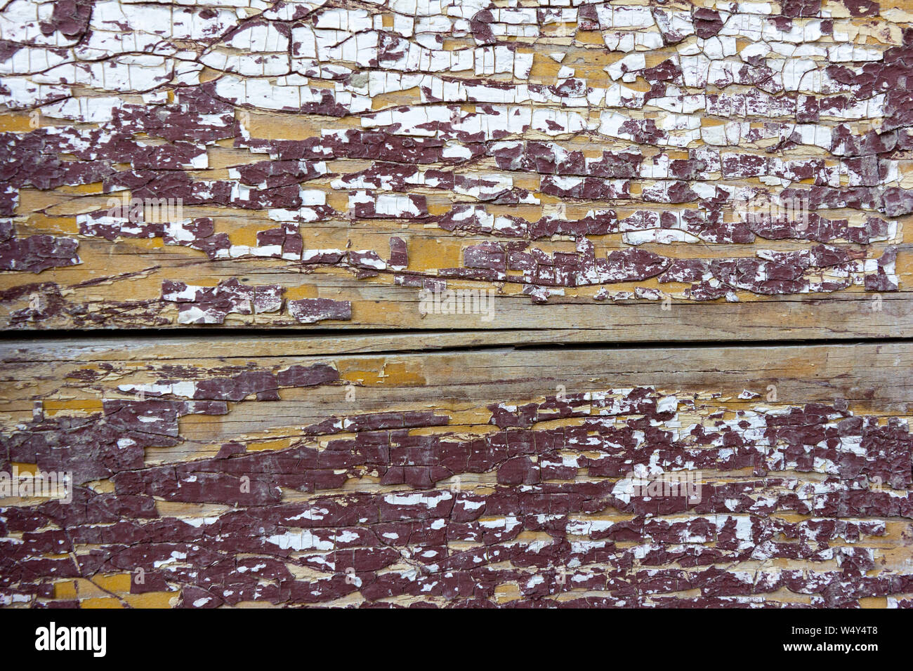 painted wood texture with the paint peeling off Stock Photo