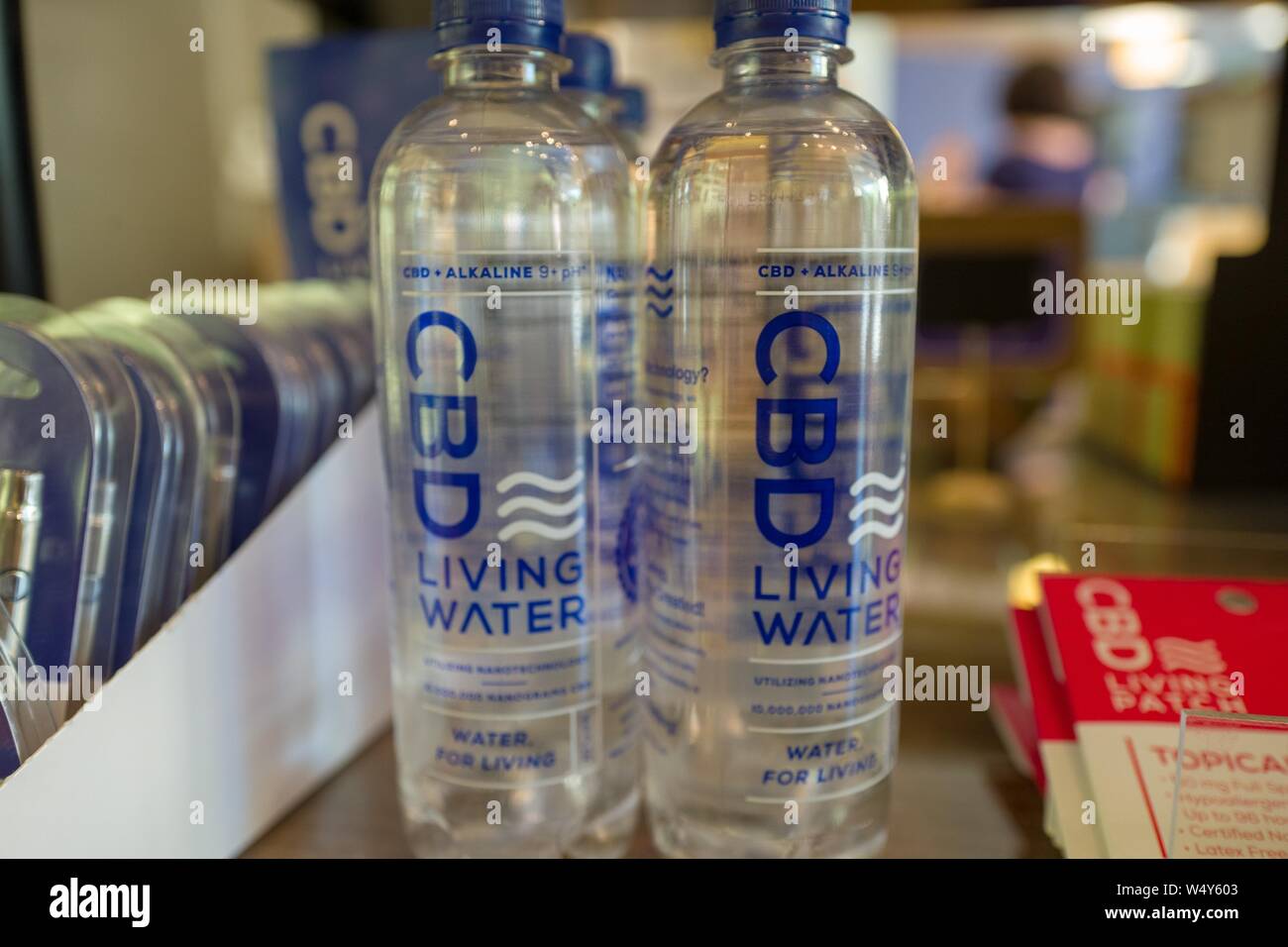 Water with nano-particles of Cannabidiol or CBD, derived from the Cannabis plant, are displayed on the shelf of a store in Walnut Creek, California, April 26, 2019. () Stock Photo