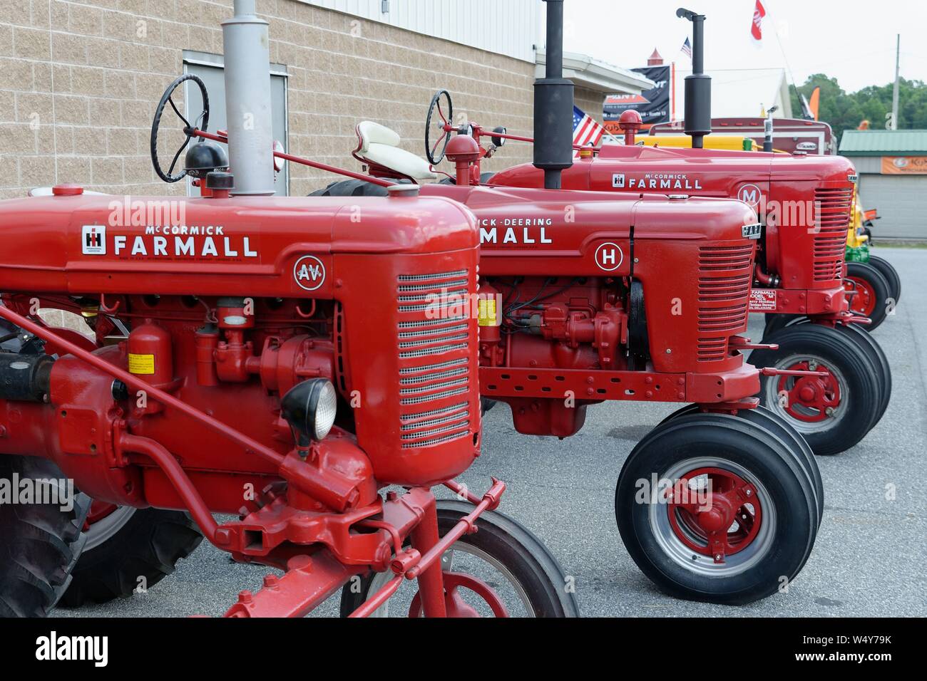 Vintage International Harvester Farmall tractors on display at the 2019
