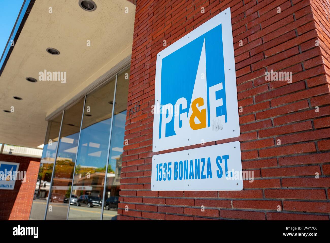 Close-up of sign with logo on facade at Pacific Gas and Electric (PGE) customer service station in Walnut Creek, California, June 6, 2019. The company faced bankruptcy concerns in 2019 following alleged wildfire liability. () Stock Photo