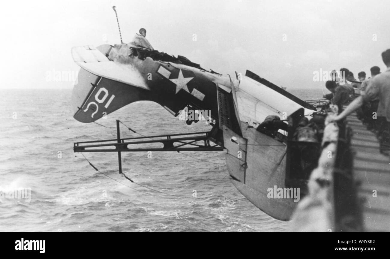 Crashed SB2C-3 Helldiver of VB-7 on USS Intrepid (CV-11) on 30 October 1944 (NH 95398). Stock Photo