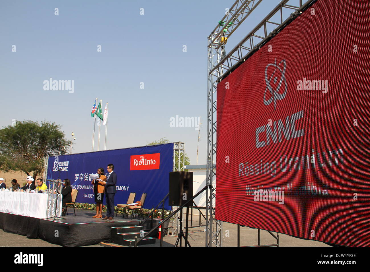 Swakopmund, Namibia. 25th July, 2019. The photo taken on July 25, 2019 shows the Rossing Uranium handover ceremony near the town of Swakopmund, Namibia. The Anglo-Australian mining giant Rio Tinto officially handed over Namibian uranium mine Rossing to its new majority shareholder, China National Nuclear Corporation (CNNC) at an event Thursday in Rossing Mine near the coastal town of Swakopmund. Credit: Wu Changwei/Xinhua/Alamy Live News Stock Photo