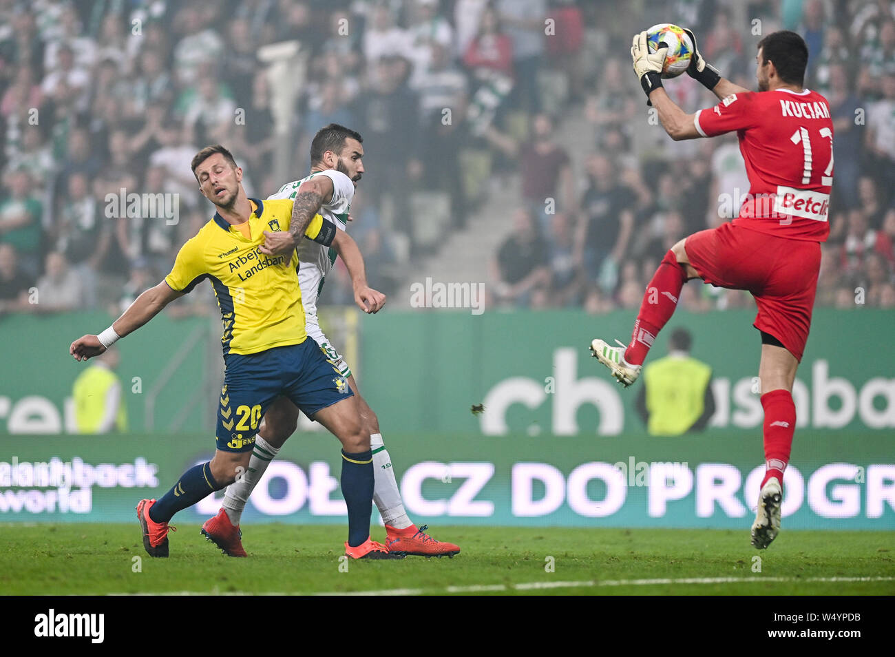 Kamil Wilczek from Brondby IF (L) Blazej Augustyn from Lechia Gdansk (C) and Dusan Kuciak from Lechia Gdansk (R) are seen in action during the UEFA Europa League Qualifiers match between Lechia Gdansk and Brondby IF at Energa Stadium.(Final score; Lechia Gdansk 2:1 Brondby IF) Stock Photo
