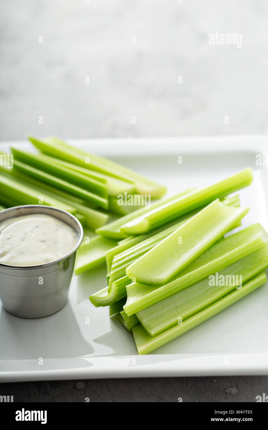 Celery sticks with ranch, healthy snack idea Stock Photo Alamy