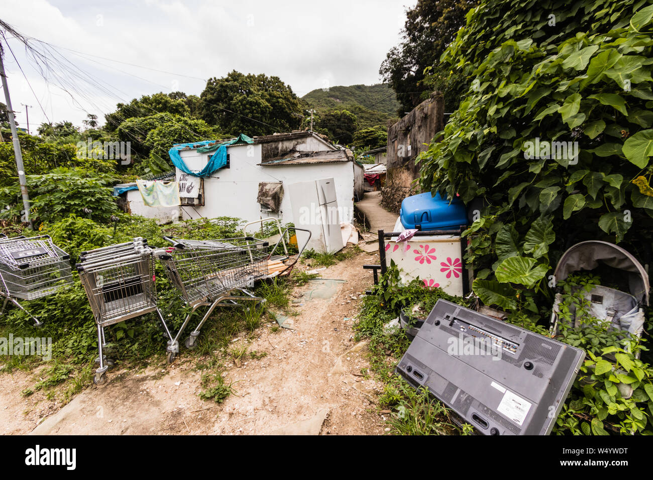 Abandoned houses in the village near Discovery Bay on the Lantau Island, Hong Kong Stock Photo