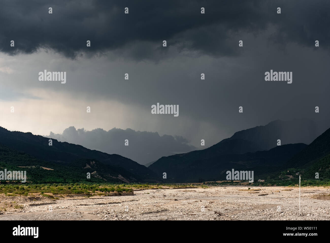 Storm clouds over the mountain range Stock Photo - Alamy