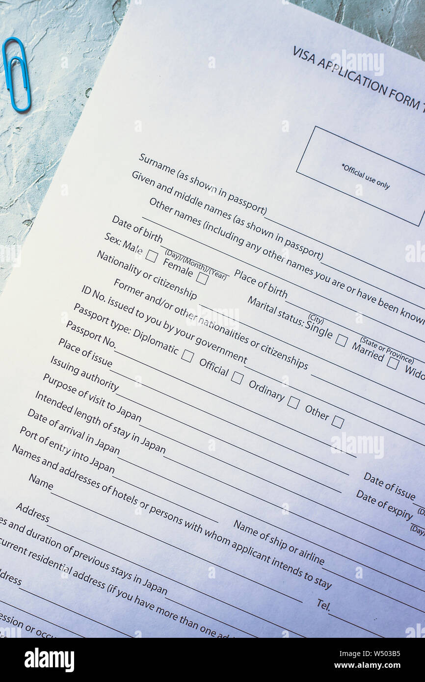 Filling the Visa application form to enter Japan Stock Photo - Alamy