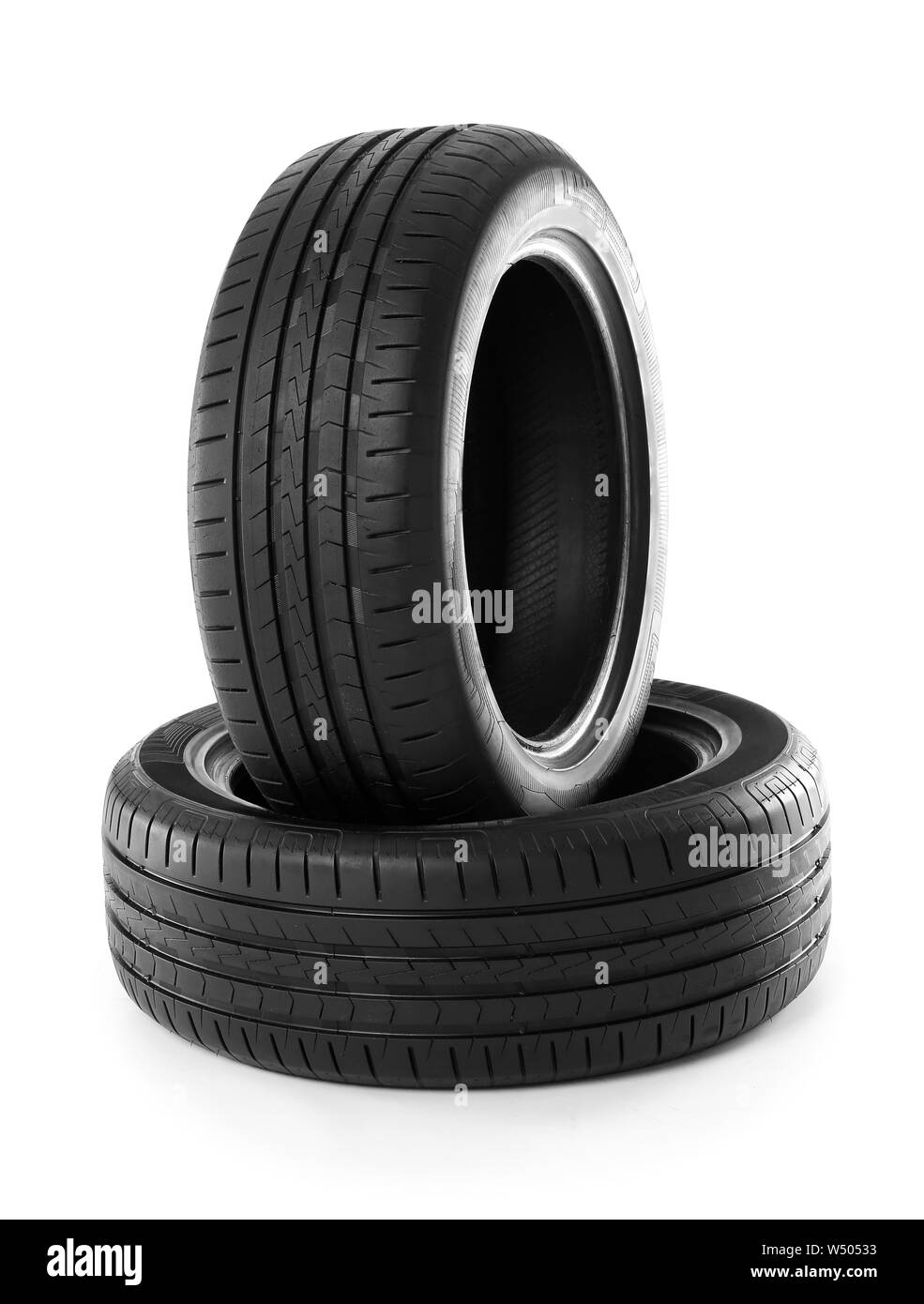 Rubber car tires on white background Stock Photo Alamy