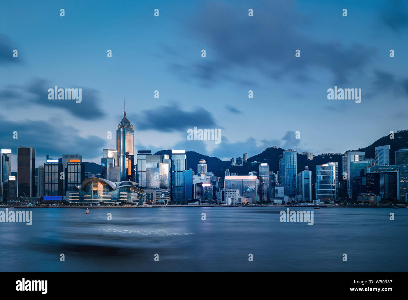 Hong Kong Skyscrapers in sunset Stock Photo - Alamy