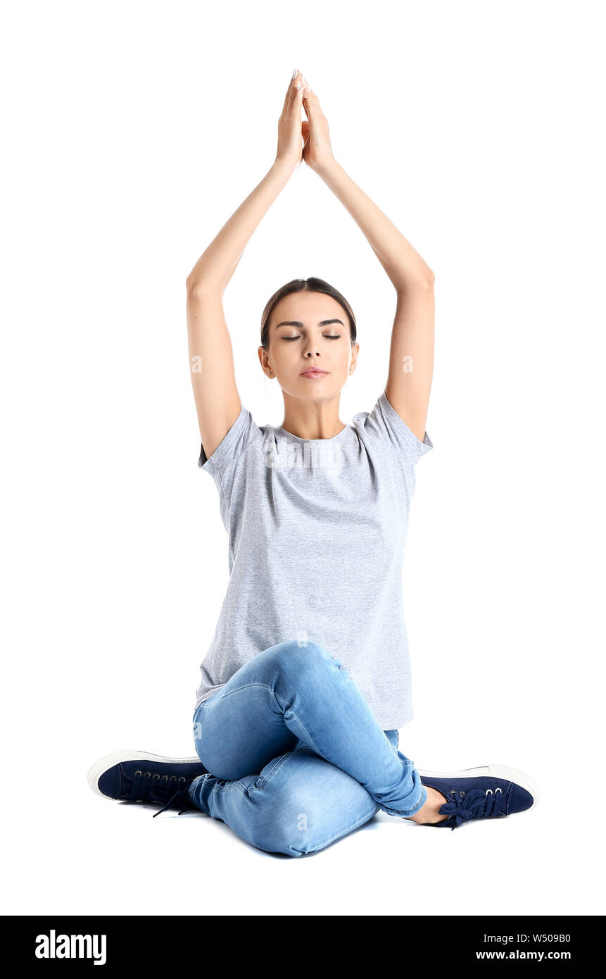 Beautiful woman practicing yoga on white background Stock Photo - Alamy