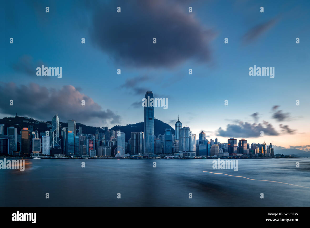 Hong Kong Skyscrapers in sunset Stock Photo - Alamy