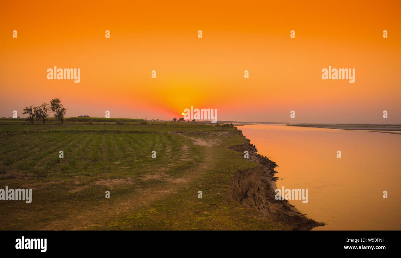 beautiful landscape image of sunset on river indus Punjab,Pakistan. Stock Photo
