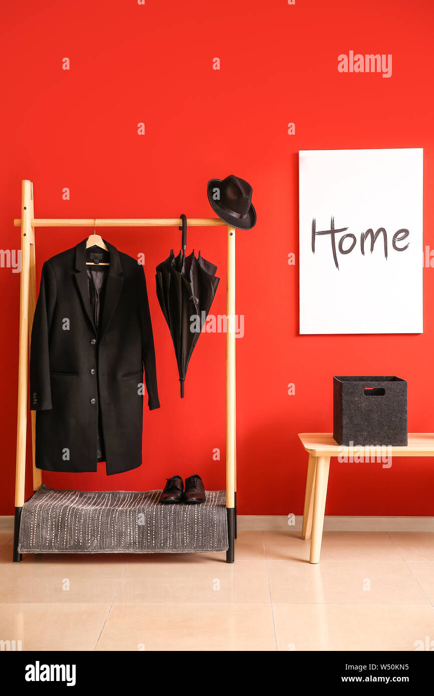hall clothes rack on Rain Coat Hanging High Resolution Stock Photography And Images Alamy