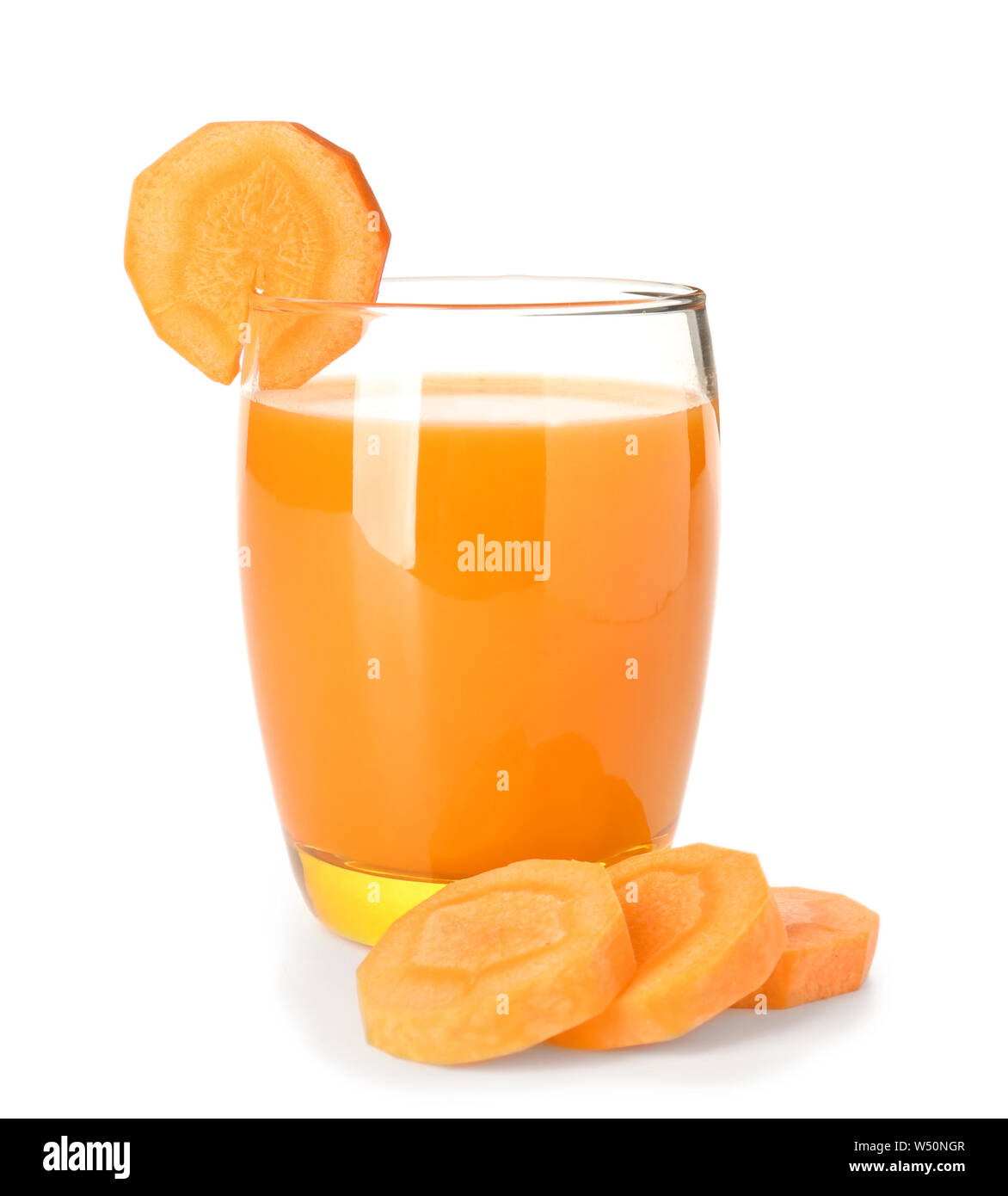 Glass of fresh carrot juice on white background Stock Photo Alamy