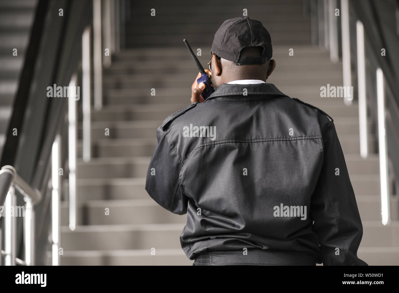 African-American security guard in building Stock Photo - Alamy