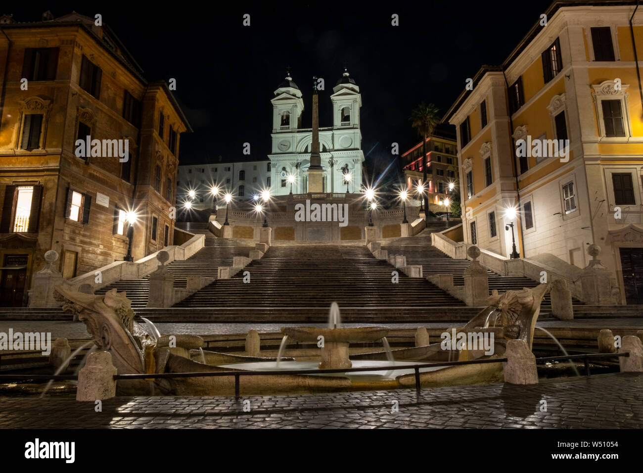 Spanish Steps Rome, Italy. Includes Fontana della Barcaccia and Santissima Trinita dei Monti. Shot at night with no people Stock Photo