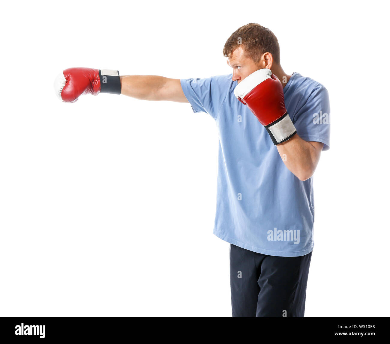 Strong male boxer on white background Stock Photo - Alamy