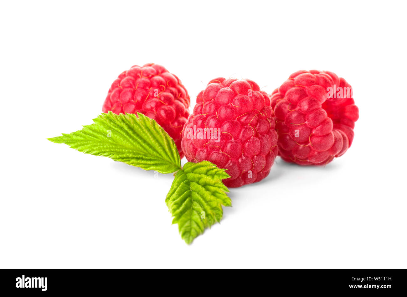 Sweet ripe raspberry on white background Stock Photo - Alamy