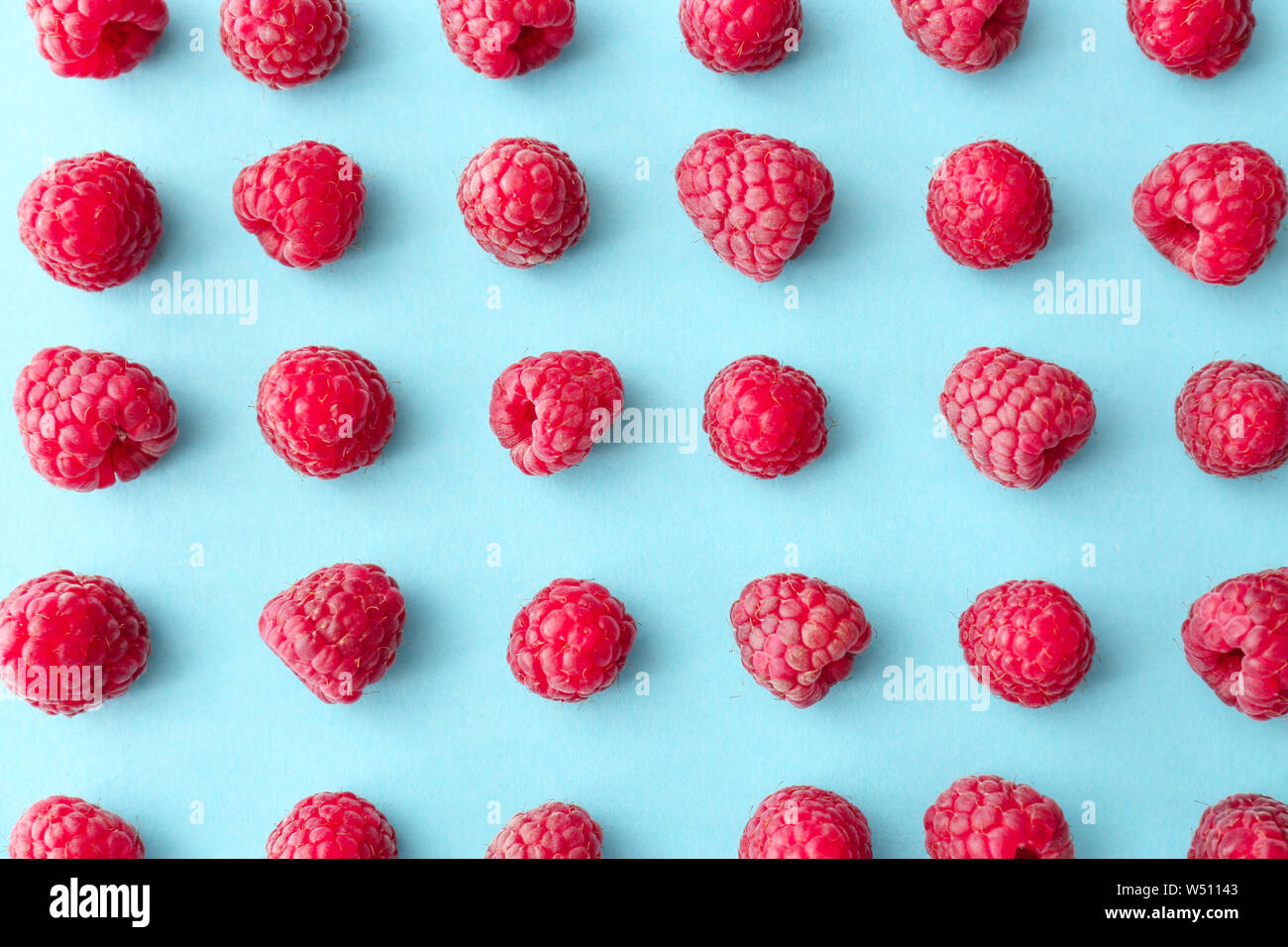 Sweet ripe raspberry on color background Stock Photo - Alamy