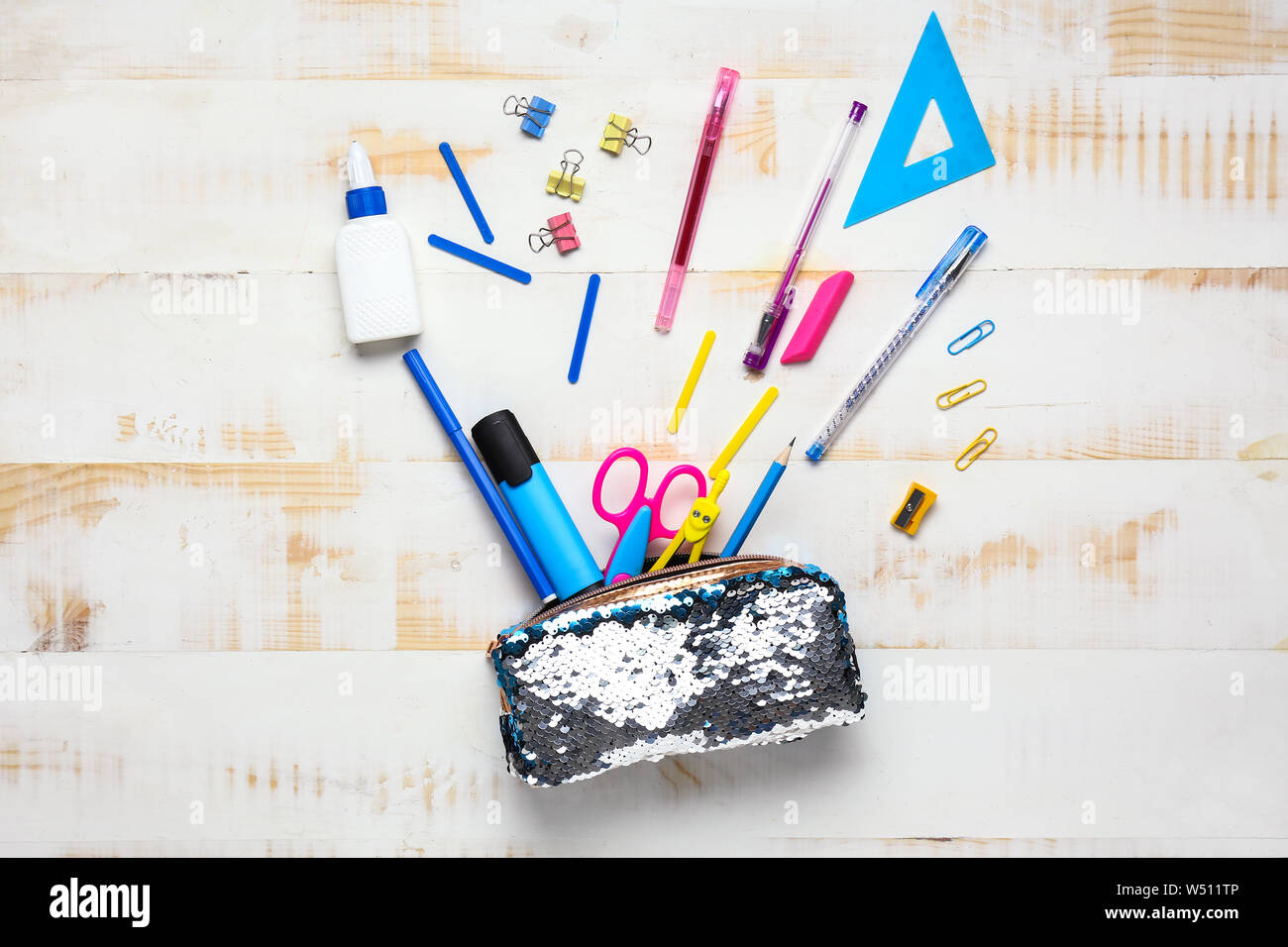 Set of school supplies on white wooden background Stock Photo