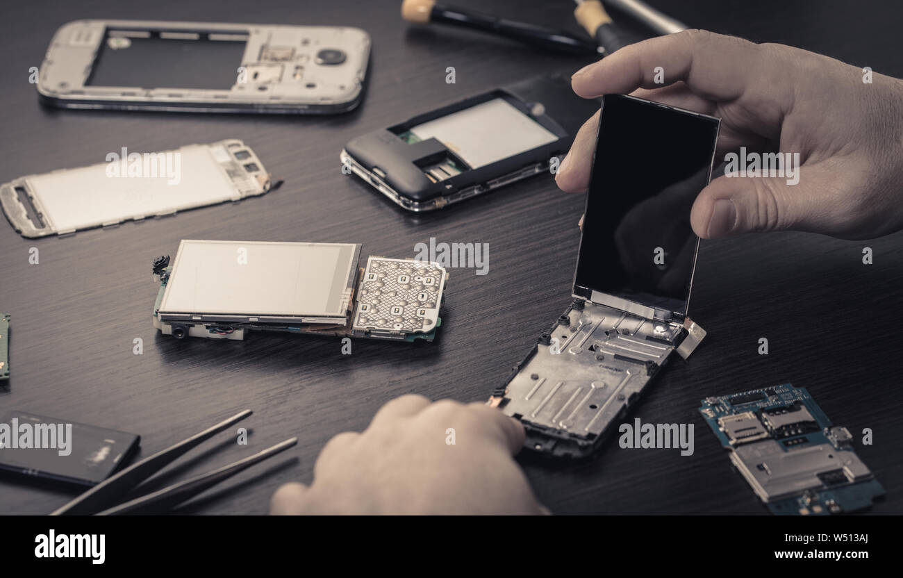 Man hands screwdriver repair hi-res stock photography and images - Alamy